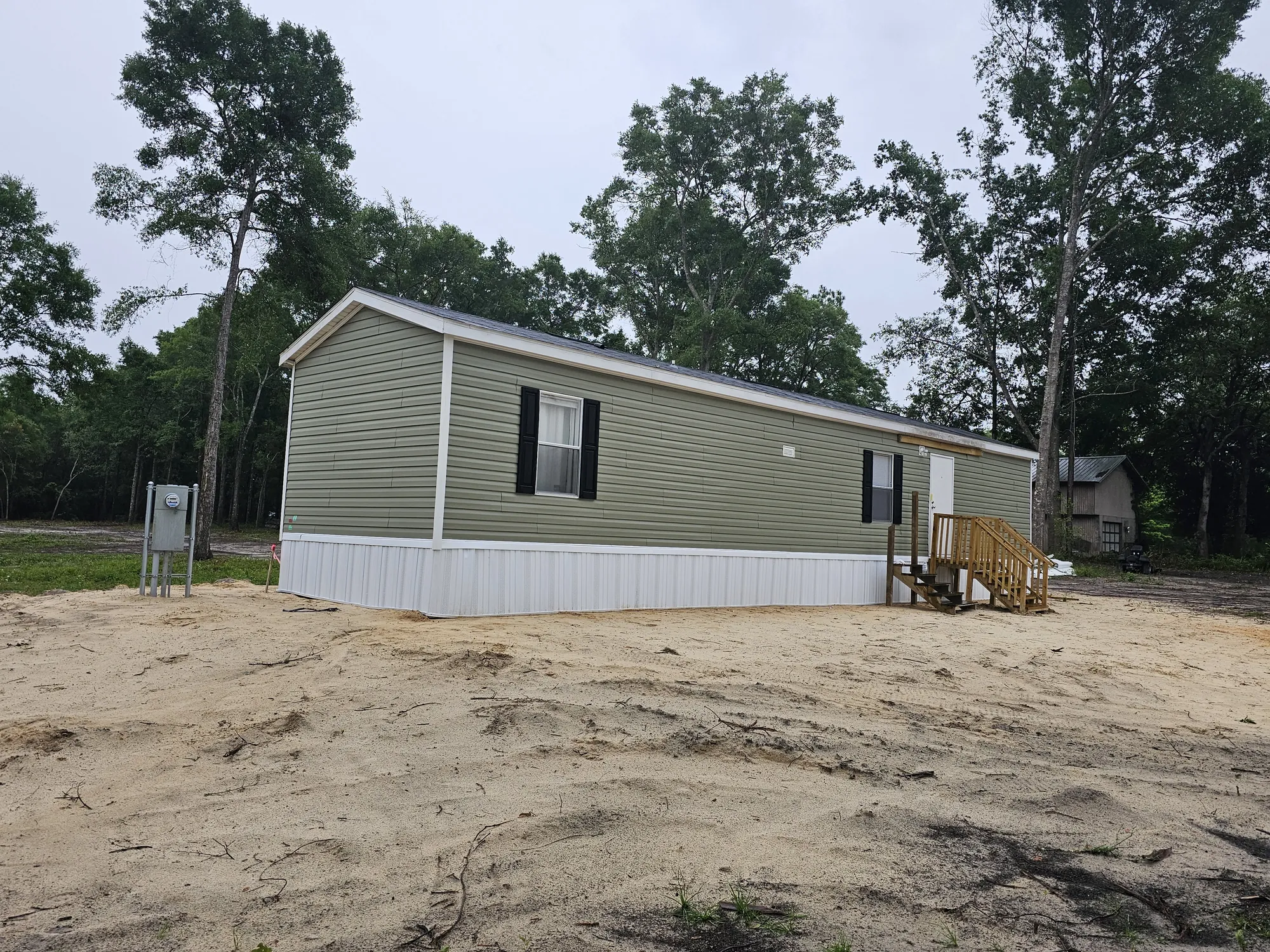 Mobile home placed on cleared and prepped rural Florida lot